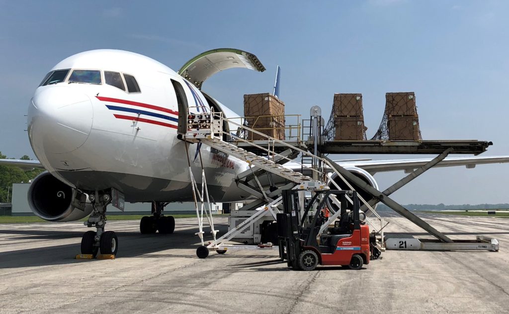 Air freight being loaded onto an airplane