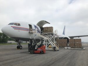 Freight being loaded onto a cargo plane