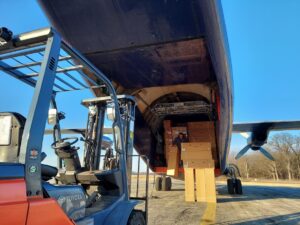 Air freight being loaded onto a plane