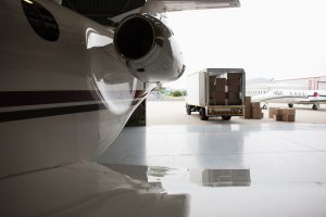 Truck with boxes to be loaded onto airplane