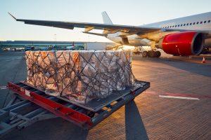 Palletized freight waiting to be loaded onto an airplane