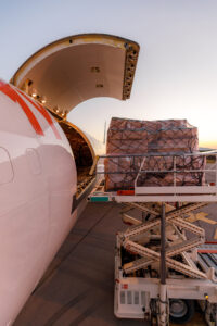 Freight being loaded onto a cargo airplane.