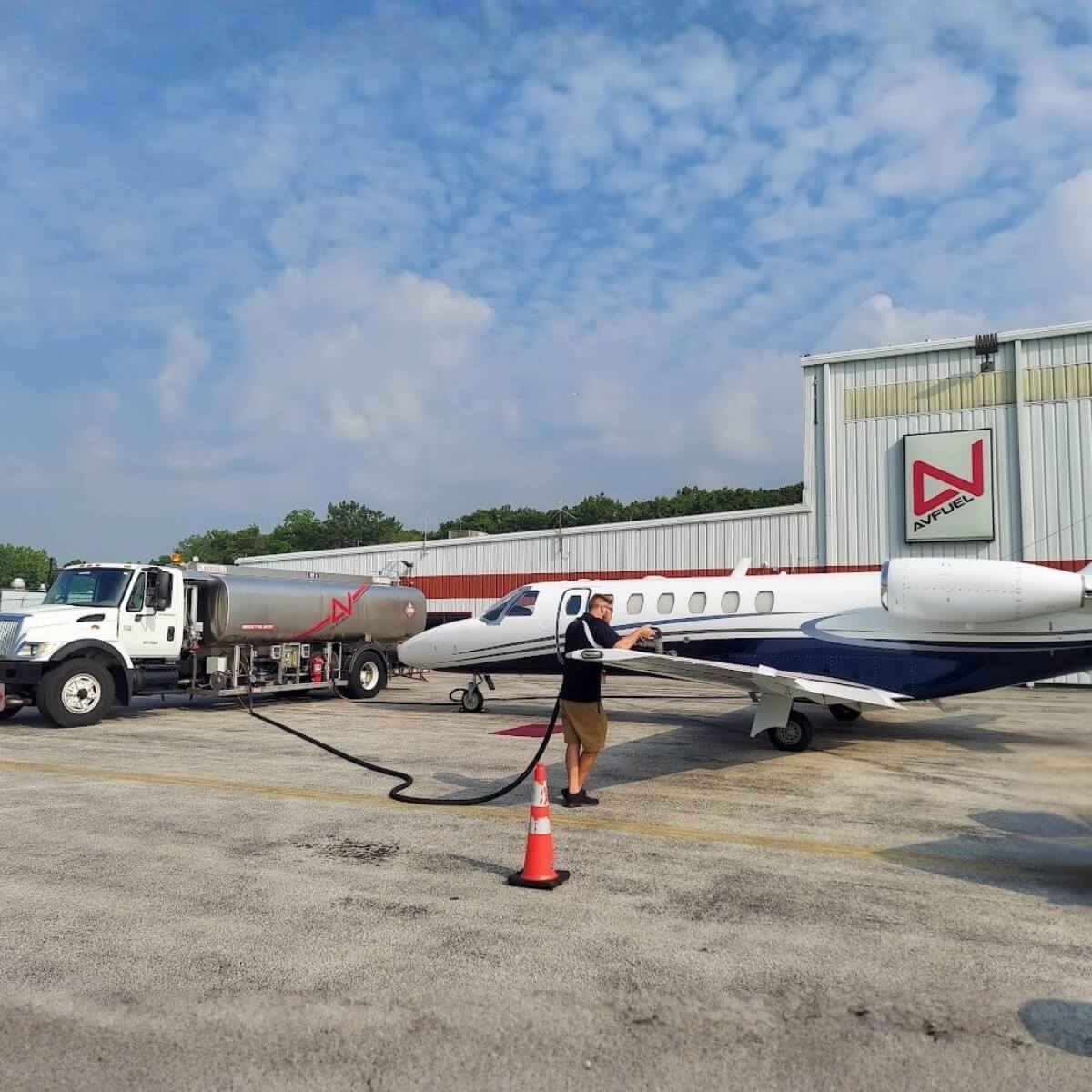 Grand Aire staff fueling a plane