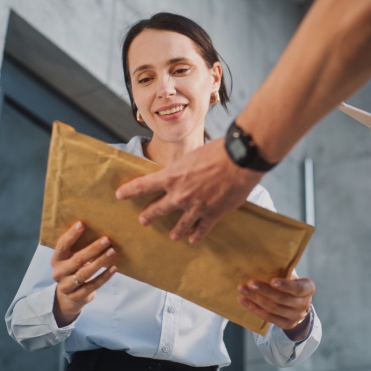 Padded envelope handed off to courier
