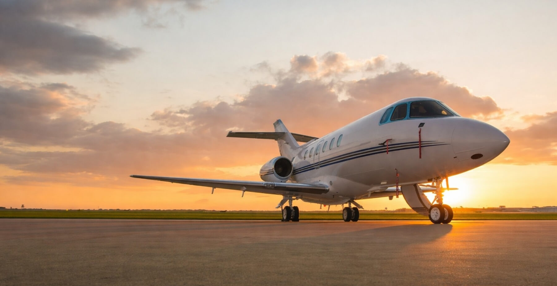 charter plane with sunset in background
