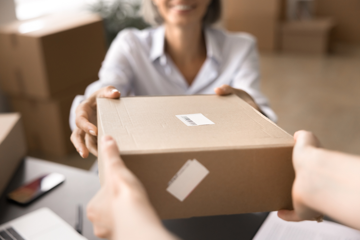 Hand Carry Service package being delivered to recipient