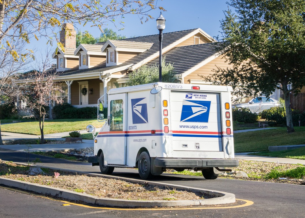 USPS truck delivering packages as a Last Mile Carrier